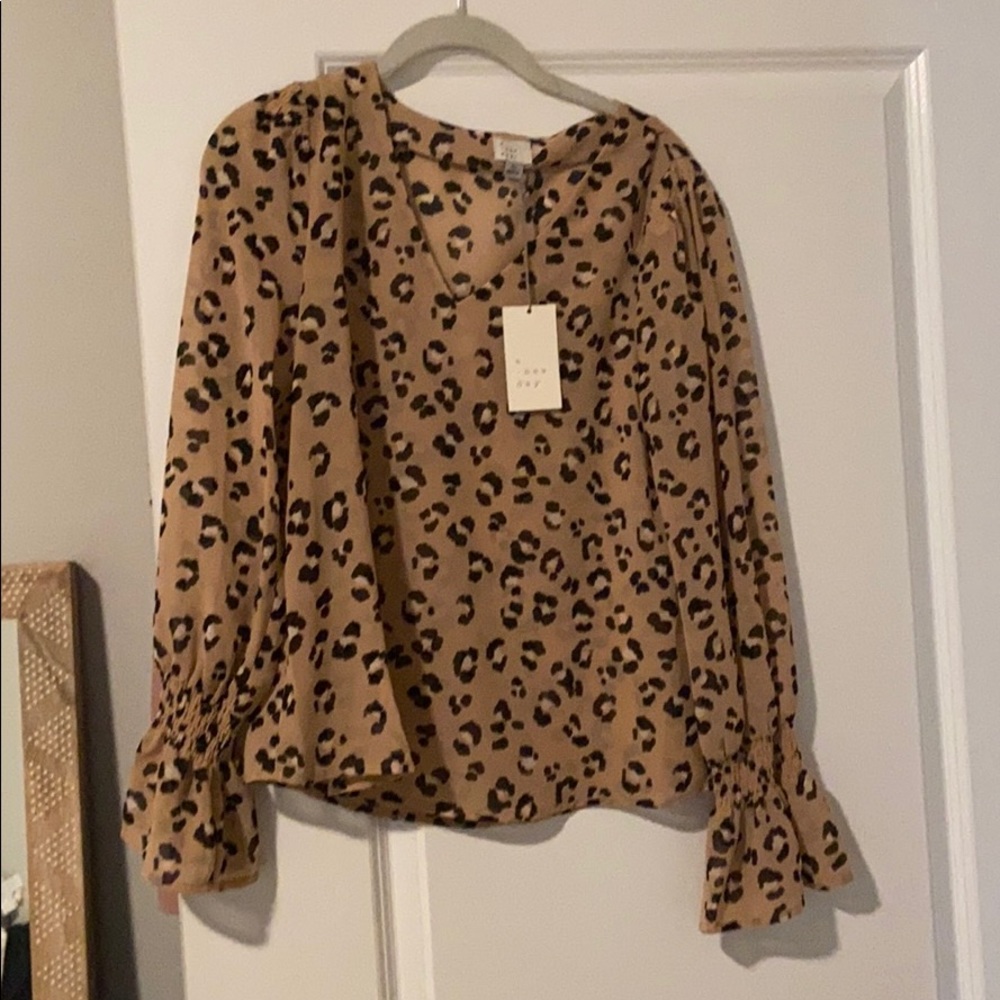Cheetah blouse never worn